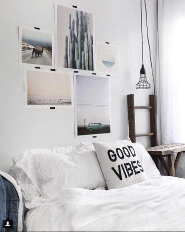 pictures above bed, art above bed