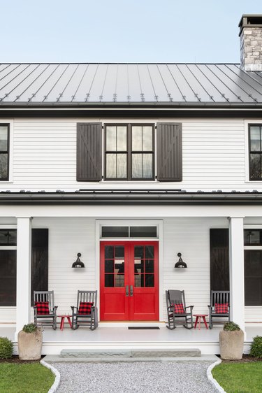 red front door color on white house with black shutters