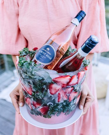 frozen ice bucket created with fruit and flowers