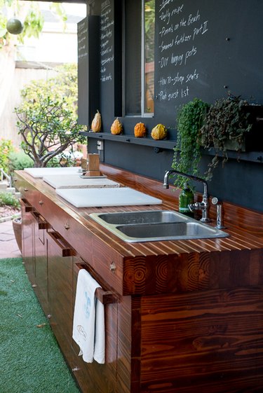 outdoor kitchen idea with chalkboard