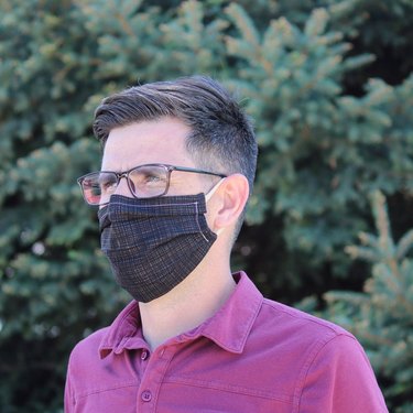 person wearing face mask and glasses