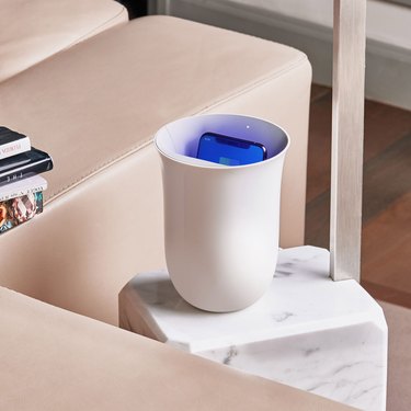wireless charging station with UV phone sanitizer
