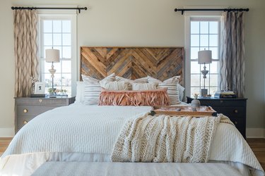 rustic bedroom headboard with luxury furnishings and rustic glam decor