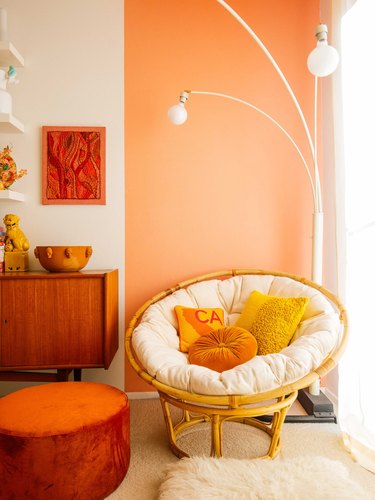 analogous colors in living room with orange, orange-yellow, and yellow accents