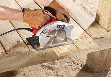 Circular saw cutting deck boards.