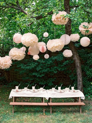 garden party with homemade pom pom decorations