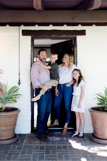 Meghan and Family in the entryway of their California adobe.