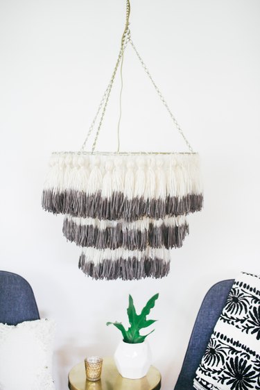 Dip-dyed tassel chandelier hanging from ceiling