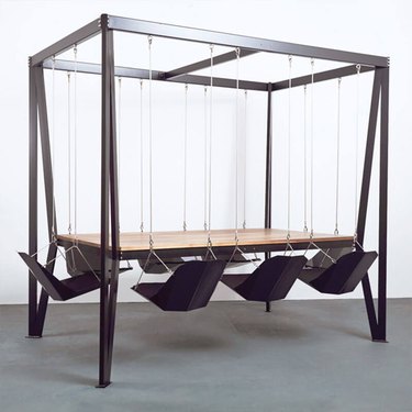 black swing table with swing chairs