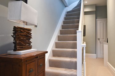 neutral stair carpet idea with white railing