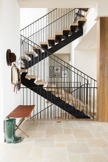 three-story modern black stair railing