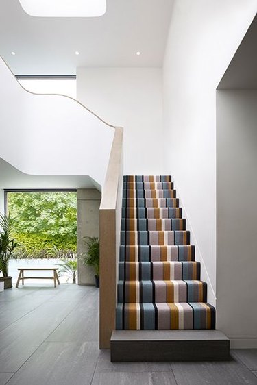 striped stair carpet idea in modern home