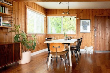 wooden blinds window treatments in wooden dining room