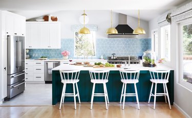 blue geometric tile kitchen backsplash idea by orlando soria