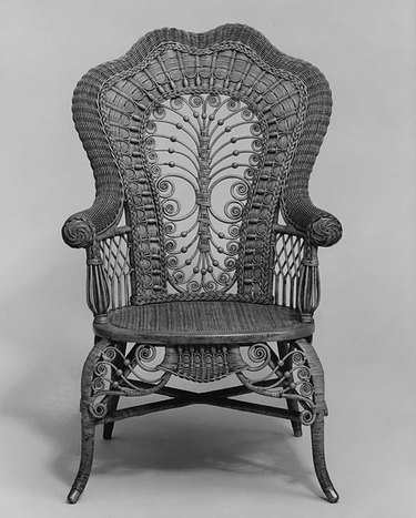 black and white image of a rattan chair