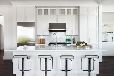 crisp white kitchen and white island