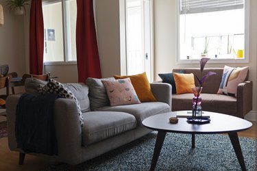 Living room with gray couch and modern coffee table