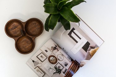 Kirsten Grove book "Simply Styling" on table with plant