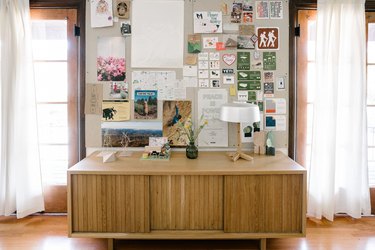 The Lodge Credenza and inspiration board in the Scout Regalia office