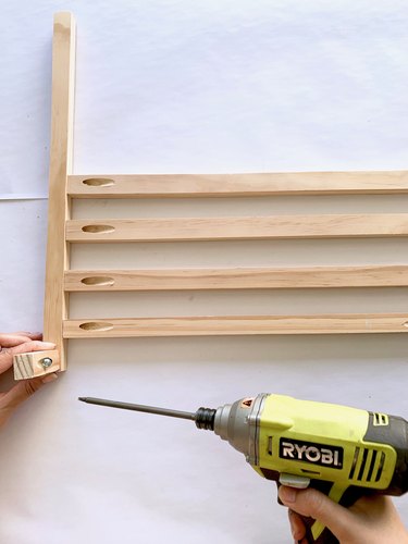 Wood dowels and drill for modern towel rack DIY