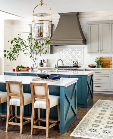 double traditional kitchen island with wood barstools