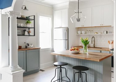 Gray and wooden beadboard traditional kitchen island