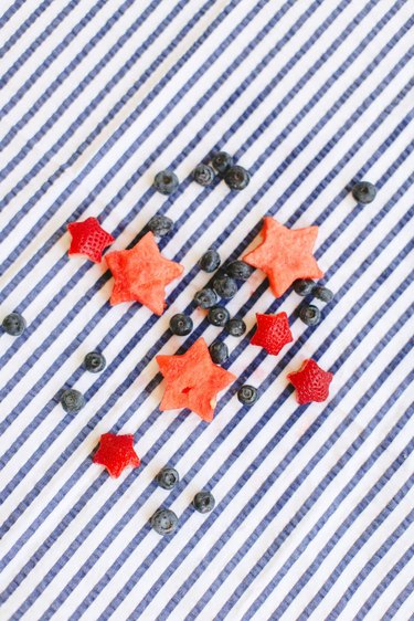 Fruit against a striped tablecloth