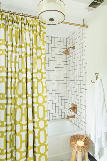 chartreuse color idea in bathroom with patterned shower curtain