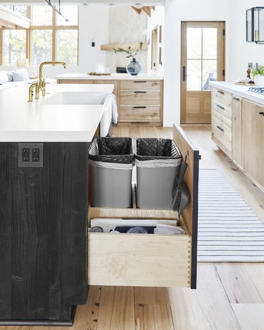 small kitchen island idea with black cabinets and white countertop
