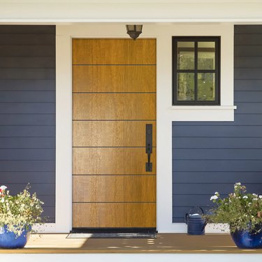 modern exterior door in wood with traditional details