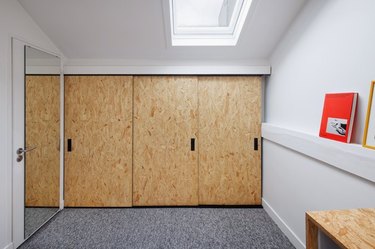 industrial closet ideas with plywood closet doors