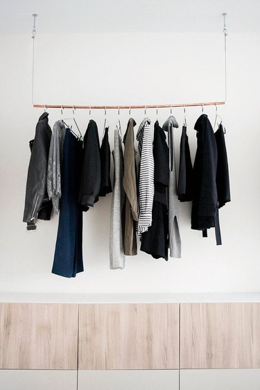 minimalist industrial closet ideas in white room