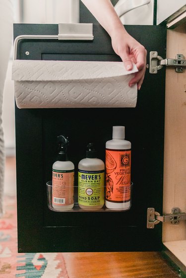 small kitchen organization idea with storage on back of cabinet door