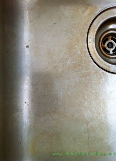 Stained stainless steel sink.