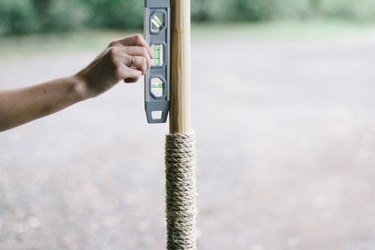 DIY & Done: Create an Outdoor Entertaining Space With String Light Poles