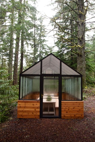 A greenhouse has become a place to share meals.