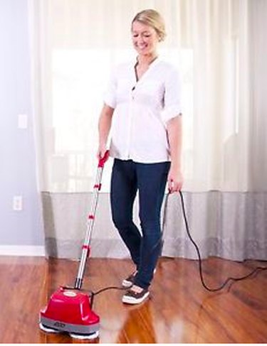 Polishing a hardwood floor.