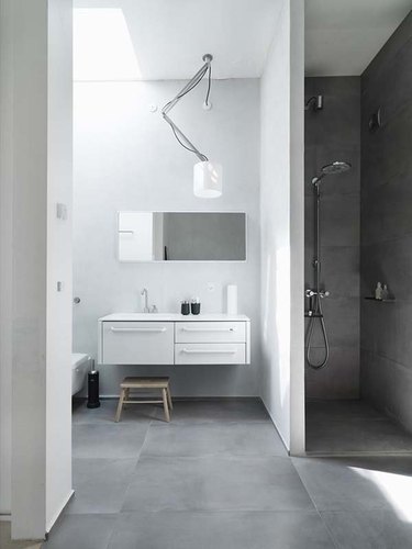 A dark concrete shower