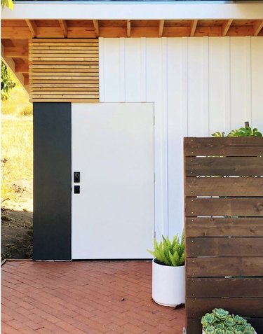 Modern garden shed with board and batten exterior and other siding