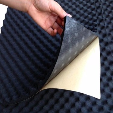 Acoustic foam with adhesive backing.