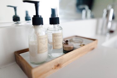 products on tray on bathroom countertop