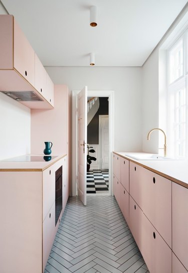 IKEA cabinets with Reform's Basis fronts and pink linoleum kitchen countertops