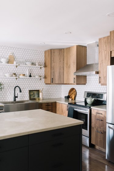 Hexagonal backsplash from counter to ceiling