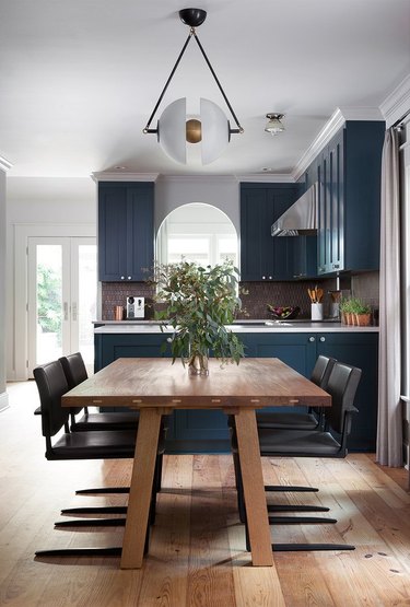 glass mosaic kitchen backsplash in midcentury kitchen