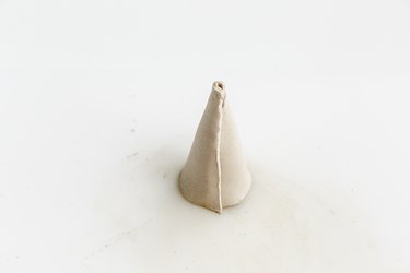 Form the cone shape.