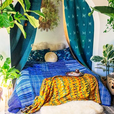 tropical bedroom idea with patterned textiles