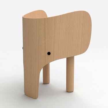 Small, all-wood chair for child shaped like an elephant