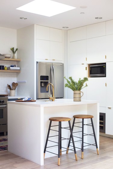 white Caesarstone kitchen countertops with white cabinets