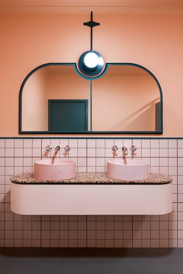 Bathroom Trends 2021 pink and black bathroom with floating vanity