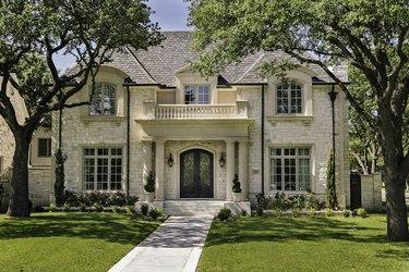 Cream stone for house exterior with balcony